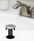 Sick Performance Bathroom Sink Drain Protector Hair Catcher With Universal Sink Stopper in stainless steel on sink.