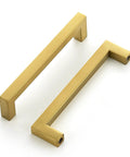 25 Pack 5 Inch Square Cabinet Handles In Brushed Brass Finish Stainless Steel Kitchen Hardware Pulls With 5 Inch Hole Center For Cabinets Gold Durable DIY Drawer Wardrobe Updates showing two angled handles on a white background.