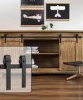 Super Mini Sliding Barn Door Hardware Kit For Double Doors Cabinets And TV Stands With J Shape Hangers In Frosted Black Carbon Steel Fits 18 Inch Door Panels From Four Fifths Inch To One And One Eighth Inch Thick Supports Up To 100 Lbs Per Door WINSOON installed on wooden cabinet