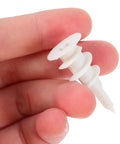 Close-up of a person holding a nylon anchor from the 20 Sets Self Drilling Drywall Screws And Nylon Anchors Kit For Gypsum And Plasterboard.