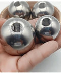 Set of four stainless steel M8-threaded balls with internal threads, chrome finish
