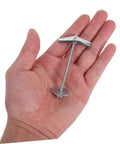 Hand holding Heavy Duty Toggle Bolt Anchors Kit With Wing Nuts For Hollow Walls And Ceilings, Carbon Steel Drywall Fasteners