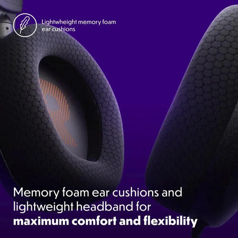 Close-up of fabric-covered memory foam ear cushions on wired over ear gaming headset with detachable microphone mute option.