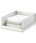 Stackable Closet Organizers Supercharge Your Home Storage Routine With Durable Wardrobe Bins Built For Seamless Bathroom Bedroom And Apartment Organization While You Kick Your Clutter Straight To The Curb. White polypropylene wardrobe bin with neatly folded towels.