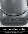 Precision Temperature Electric Kettle With 1500W Fast Boil 7 Cup Capacity BPA Free Stainless Hold Temp Setting And 7 Presets For Green Tea White Tea Oolong Black Tea Herbal Tea And Coffee showing live temperature reading on control panel.