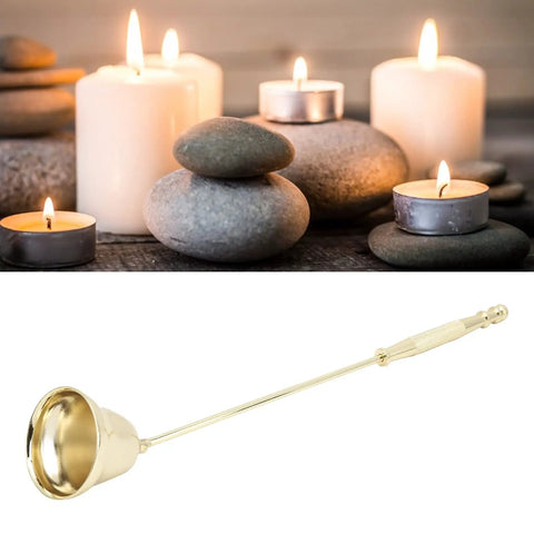 Slick Stainless Steel Candle Snuffer With Ergonomic Long Handle And Hassle Free Wick Control For Tapered Dinner Candles And Fresh Home Decor Setup In Classic Gold Finish placed amidst candles and stones.