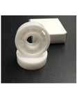 Premium Ceramic 627 Bearings With Dual PTFE Seals For Quad Skates on display, highlighting smooth white ceramic material.