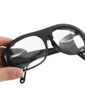 Professional Grade Welding Safety Glasses With Flip Up Lens For Argon Arc And Metalworking 6 Pack being held by hand.