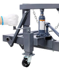 Dual Wheel Truck Dolly With Integrated Jack And 1500 Lb Capacity Adjustable Height for Heavy Trucks showing hand cranking jack system.