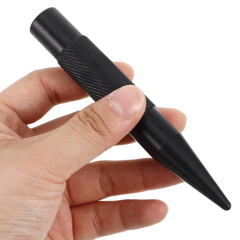 Close-up of black scratch pen from Tough As Nails Auto Body Hammer And Car Dent Repair Pen for quick panel fixes.