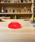 Tough Plastic Smoke Alarm Covers Four Pack Waterproof Dust Protector Shield Keep Kitchen Detectors Spotless on table.