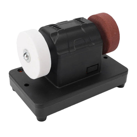 Cordless Mini Bench Grinder With 3 Inch Wheel And Variable Speed Shifting From 2000 To 6000 Rpm showing dual grit discs on black base.