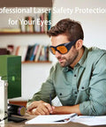 Pro Grade Multi Wavelength Laser Safety Glasses With Heavy Duty Optics Spanning 180 To 1095 Nm For Industrial Medical And Lab Work That Keep Your Vision Crisp And Bulletproof, worn by man in a lab setting.