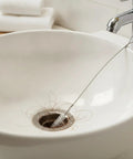 Heavy Duty Flexible Steel Drain Auger Knocks Stubborn Sink Clogs Dead Clears AC Condensate Lines And Bathroom Pipes With Ease Eco Friendly Way. Wire in sink with hair.