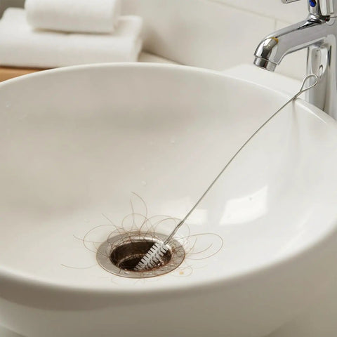 Heavy Duty Flexible Steel Drain Auger Knocks Stubborn Sink Clogs Dead Clears AC Condensate Lines And Bathroom Pipes With Ease Eco Friendly Way. Wire in sink with hair.