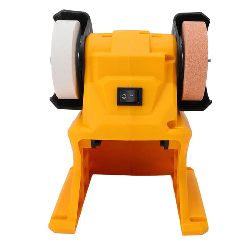 Cordless Mini Bench Grinder with Dual 70mm Wheels Spinning at 5500 RPM Delivers Lightning Fast Sharpening for Any Project in the Garage or Workshop Featuring a Featherlight Build that Lets You Carry It wherever You Need It for Maximum Flexibility on the, showing front view with switch and wheels.