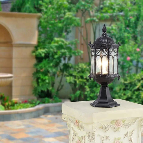 JUDYSSY Security Lights Outdoor/lot Led Flood Light Outdoor Floodlight Spotlight IP67 Waterproof on a decorative outdoor pedestal.