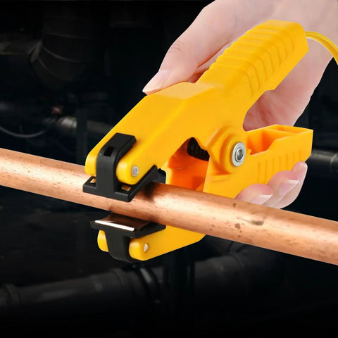 Yellow plastic temperature clamp for HVAC K-Type thermocouple installed on copper pipe