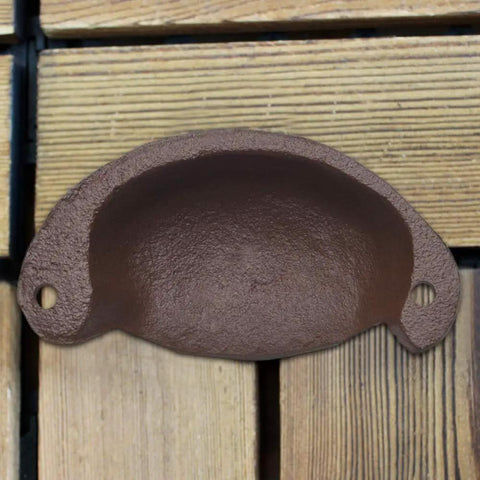 Solid As A Rock Brass Retro Drawer Pull Knockout Vintage Cast Iron Cabinet Knob top view showing rustic brown finish and mounting holes.