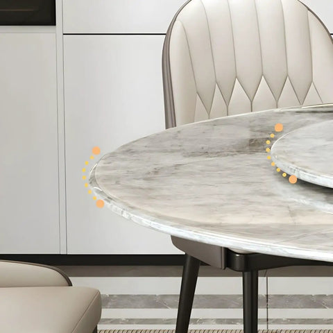 Close-up of Top Shelf Faux Marble Round Dining Table With Effortless Spin Lazy Susan Turntable Solid Black Metal Pedestal Base.