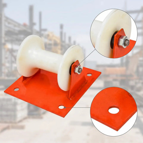 Heavy Duty Cable Guide Wheel With Ground Mount Steel Support Bracket And Slick Aluminum Pulley Roller close-up showing aluminum roller and red base.