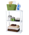 White Three Tier Storage Rack 24X12X33 Inches Light Duty Shelving System For Home Garage Or Laundry Room with bins and towels.