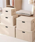 Heavy Duty Fabric Storage Bins With Snap On Lids Stackable Khaki Storage Boxes neatly stacked in a modern room.