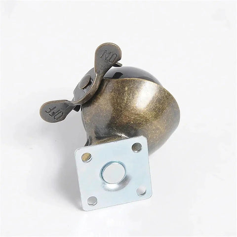 Slick Heavy Duty 2 Inch Swivel Ball Casters In Antique Copper And Brass Finishes For Vintage Furniture And Office Chairs Smooth Rolling Action with brake lever.