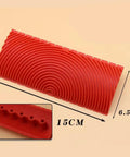 Two Piece Rock Solid Faux Wood Grain Roller Kit For Super Smooth Wall And Furniture Texture Painting With Durable Rubber Design Stamping Tools. Red rubber stamp with wave patterns, measures 15cm by 6.5cm.
