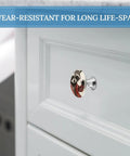 2 Pack Super Slick Red Raccoon Painted Drawer Knobs With Hella Tough 1.1 Inch Stainless Steel Base mounted on white cabinet.