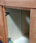 Installing Premium Full Overlay Soft Close Cabinet Hinge For Kitchen And Pantry Doors with a power drill in a wooden cabinet.