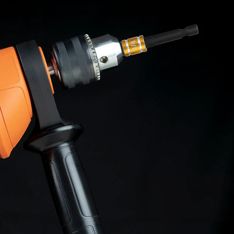 Close-up of Heavy Duty Seven Piece Steel Socket Adapter Kit with Rock Hard Finish on cordless drill.
