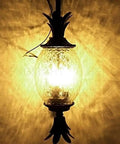 Badass Outdoor Wall Sconce Featuring Waterproof Glass Lantern Design For Courtyards And Spacious Patios, illuminated vintage glass lantern.