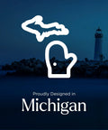 Proudly Designed in Michigan logo featuring a mitten and state outline on a dark coastal background.
