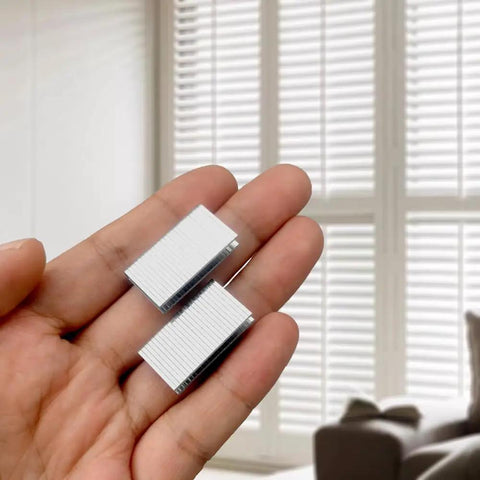 Fixin Your Shutters Now Score This Plantation Shutter Staple Repair Kit With 40 Pieces To Mend Broken Hardware and bring back smooth gliding action for windows measuring 15X5mm across for a stress free home, shown in hand.
