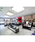 Well-lit retail store featuring 15 Watt LED PAR38 Reflector Bulb, 2700K Warm White, Dimmable, E26 Base, 60 Degree Beam, 120 Volt.