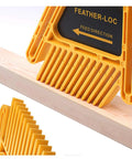 Close-up of yellow Featherboard Push Block Set for Table Saws and Miter Slots Two Pack with directional arrow detail