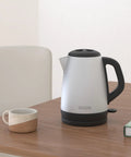 1.7L Cordless Electric Kettle With Rapid Boil Technology And Auto Shutoff, Stainless Steel Water Heater For Tea And Coffee, KE1700SD on table