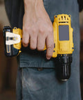 Heavy Duty Steel Belt Clip Hooks For Drill Drivers With Screws Rugged Tool Belt Clips For Secure On Site Tool Carry Rust Resistant Durable Replacement Clips That Stand Up To Tough Worksites, drill held at side