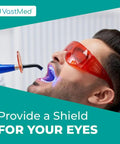 Top Shelf Tough As Nails Dental Protective Goggles With Red Laser Lens, worn during dental procedures for eye protection.