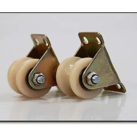 Badass Heavy Duty Nylon Groove Caster Wheel With Dual Bearings shown in close-up, 4 inch wheel for sliding doors or gates.