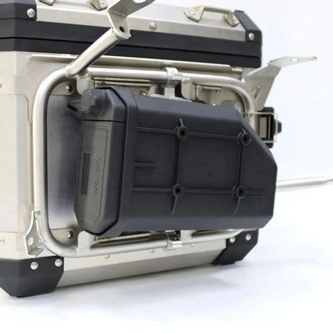 Badass Motorcycle Side Tool Box For CRF1000L Cargo Rack with sturdy black metal shell attached to rear frame.