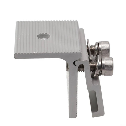 Kickass Solar Panel Roof Clamps Built With Boss Grade Aluminum Plus Rust Resistant Stainless Steel Screws For Standing Seam Photovoltaic Metal Roofs. Close-up view of a heavy-duty aluminum clamp with stainless screws.