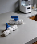 5 Pack 3 8 Inch Push In Ball Valve Quick Connect Plumbing Fitting Leak Proof Polypropylene on countertop.
