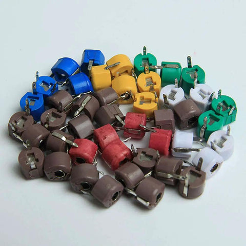 Awesome 45 Piece 6Mm Trimmer Capacitor Kit featuring nine separate values; assorted colors in a pile, ideal for radio circuit adjustments.