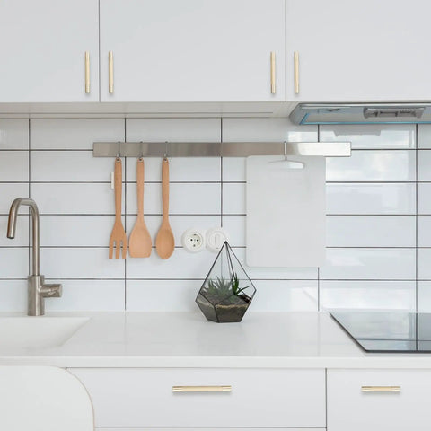 Boss Level Brushed Brass Cabinet Pulls Featuring A Knurled Grip Texture Premium Kitchen Drawer Handles With Damn Tough Corrosion Defense Solid 10 Pack on white kitchen cabinets.