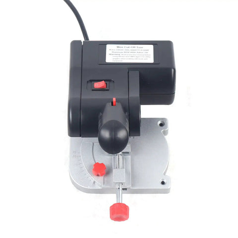 Top Shelf Mini Bench Cut Off Saw With Buttery Smooth Blade Swap And Rock Solid Countertop Clamps For Precision Angled Cuts On Wood Metal Plastic And Glass, top view showing controls and adjustable clamp.