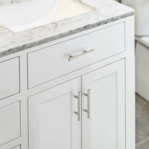 30 Pack 5 Inch Cabinet Pulls With 3 Inch Hole Centers Zinc Alloy Handles In Brushed Nickel Finish Installed on White Cabinet