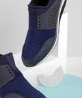 Tough As Nails Shoe Heel Pads 4Mm Thick Rubber Non Skid Adhesive Repair Kit placed next to stylish navy sneakers.