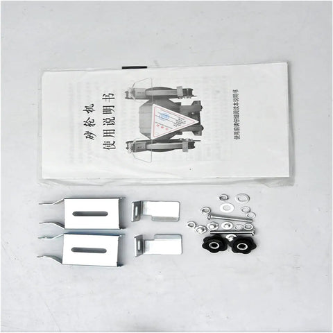No Sweat Five Inch Desktop Bench Grinder Sharpener accessories including metal brackets, screws, and user manual on a white background.